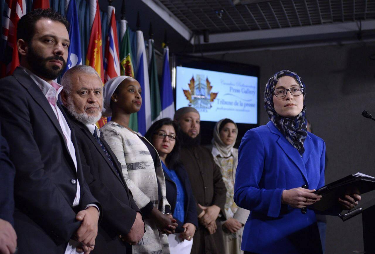 National Council of Canadian Muslims communications director Amira Elghawaby listens to a reporter’s question as leaders of national and Quebec organizations joined the NCCM to call on governments to counter Islamophobia, racism and discrimination, on Parliament Hill on Wednesday, Feb. 8, 2017 in Ottawa. Prime Minister Justin Trudeau has announced the appointment of Elghawaby as Canada’s first special representative to combat Islamophobia.THE CANADIAN PRESS/Justin Tang