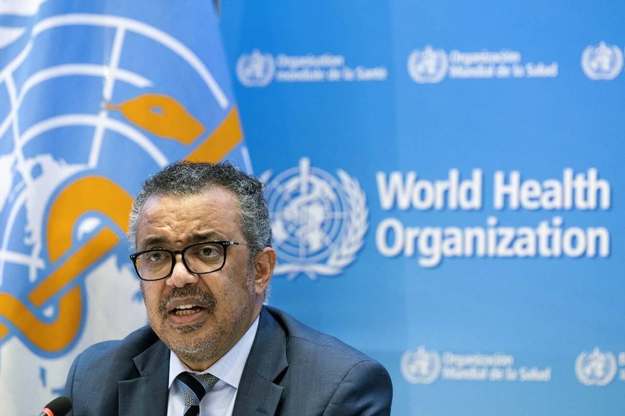 Tedros Adhanom Ghebreyesus, Director General of the World Health Organization (WHO), talks to the media at the World Health Organization (WHO) headquarters in Geneva, Switzerland, Monday, Dec. 20, 2021. Monday could mark a major milestone in the history of the COVID-19 pandemic, as the World Health Organization stands poised to decide whether or not to declare an end to the global public health emergency. THE CANADIAN PRESS/Keystone via AP-Salvatore Di Nolfi