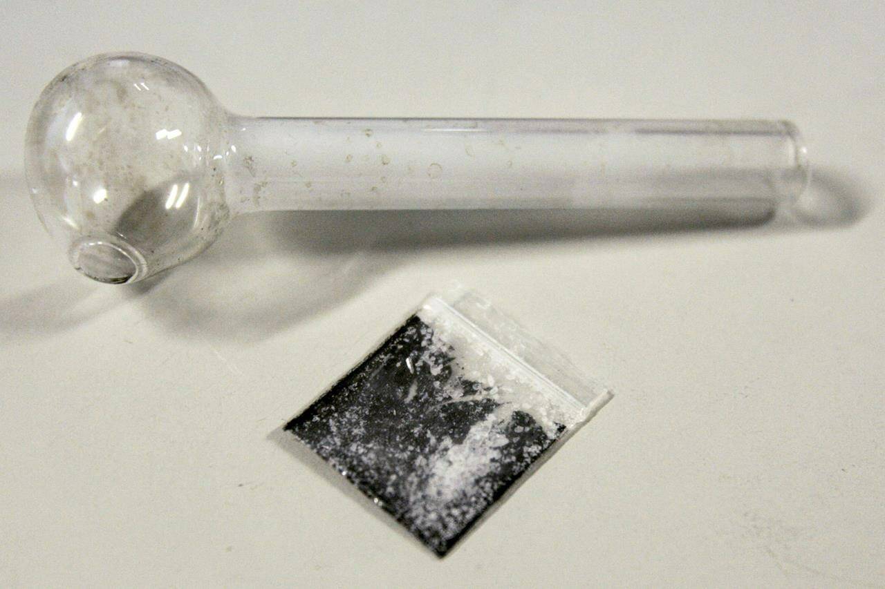 A pouch containing crystallized methamphetamine and a homemade pipe are shown March 21, 2006, in Window Rock, Ariz. Decriminalization of some hard drugs began in B.C. on Tuesday after the federal government granted B.C.’s request for an exemption from the Controlled Drugs and Substances Act as part of a plan to combat an overdose crisis that has claimed over 11,000 lives since 2016.THE CANADIAN PRESS/AP-Matt York