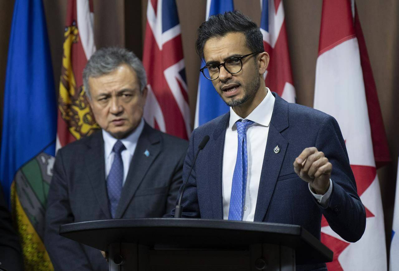 Liberal MP for Pierrefonds-Dollard, Sameer Zuberi speaks as World Uyghur Congress President, Dolkun Isa looks on during a news conference, Wednesday, February 1, 2023 in Ottawa. THE CANADIAN PRESS/Adrian Wyld