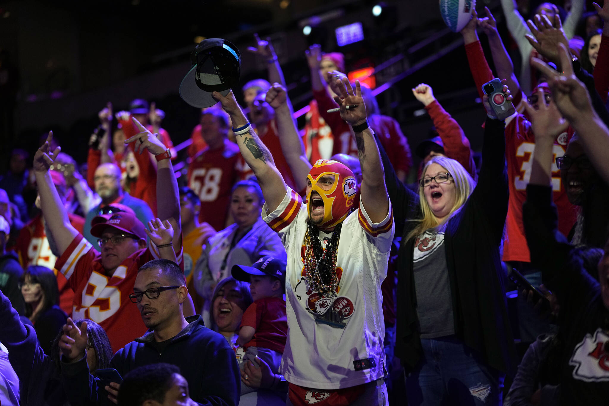 Kansas City Chiefs fans cheer during the NFL football Super Bowl 57 opening night, Monday, Feb. 6, 2023, in Phoenix. The Kansas City Chiefs will play the Philadelphia Eagles on Sunday. (AP Photo/Matt York)