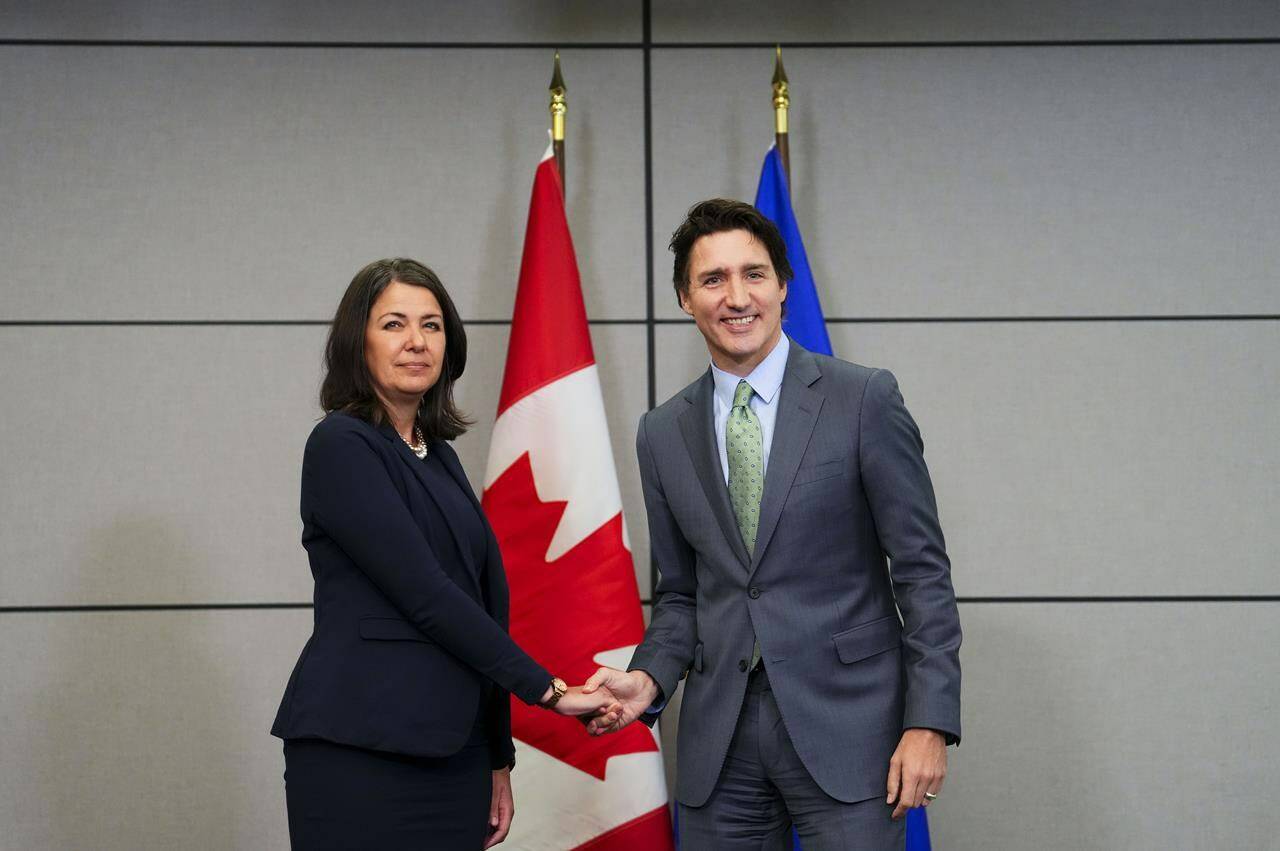 Prime Minister Justin Trudeau meets with Alberta Premier Danielle Smith as Canada’s premiers meet in Ottawa on Tuesday, Feb. 7, 2023 in Ottawa. Alberta Premier Danielle Smith has met face to face with Prime Minister Justin Trudeau in a photo opportunity punctuated by short statements and a very awkward handshake. THE CANADIAN PRESS/Sean Kilpatrick
Prime Minister Justin Trudeau meets with Alberta Premier Danielle Smith as Canada’s premiers meet in Ottawa on Tuesday, Feb. 7, 2023 in Ottawa. Alberta Premier Danielle Smith has met face to face with Prime Minister Justin Trudeau in a photo opportunity punctuated by short statements and a very awkward handshake. THE CANADIAN PRESS/Sean Kilpatrick