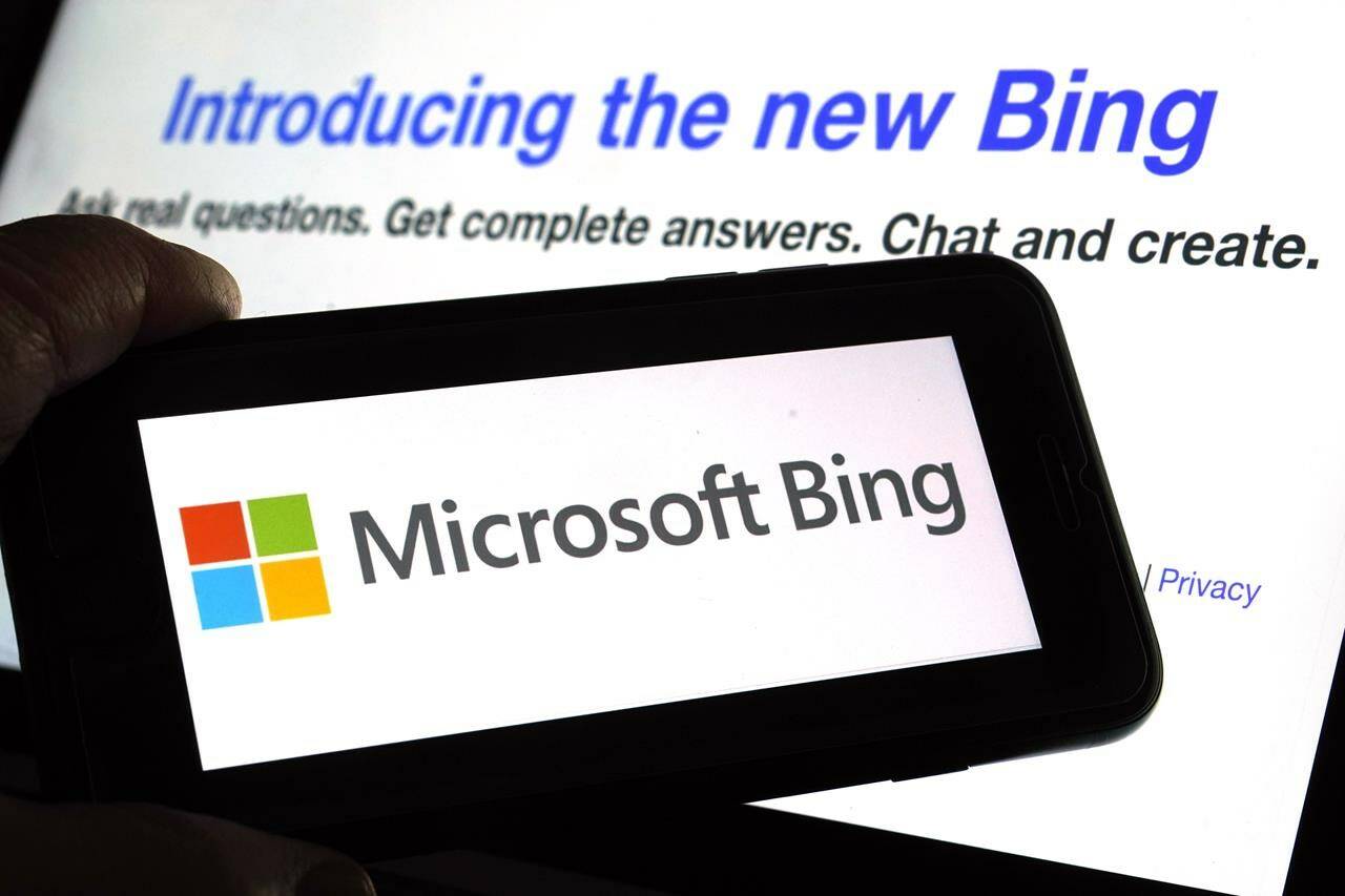 The Microsoft Bing logo and the website’s page are shown in this photo taken in New York on Tuesday, Feb. 7, 2023. Microsoft is fusing ChatGPT-like technology into its search engine Bing, transforming an internet service that now trails far behind Google into a new way of communicating with artificial intelligence. (AP Photo/Richard Drew)