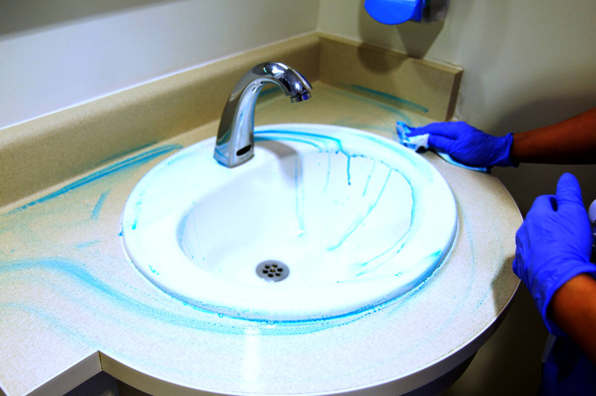 Highlight, a new disinfectant wipe system, has been implemented by Langley Memorial Hospital and other hospitals within the Fraser Health region to reduce the risk of infections. Staff here can be seen using the blue coloured wipes, which fade to clear if cleaning is thorough. (Special to Langley Advance Times)