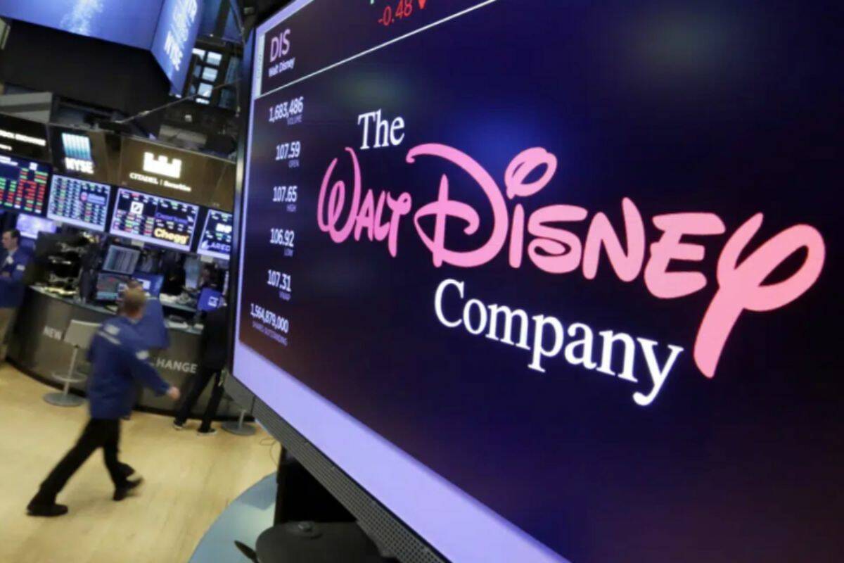 FILE - In this Aug. 8, 2017, file photo, The Walt Disney Co. logo appears on a screen above the floor of the New York Stock Exchange. Disney is working on sequels for its “Toy Story,” “Frozen” and “Zootopia” franchises as the company concentrates more on brands that have continued to perform well. The Walt Disney Co. is working on a “strategic transformation,” announced by CEO Bob Iger on Wednesday, Feb. 8 2023. (AP Photo/Richard Drew, File)