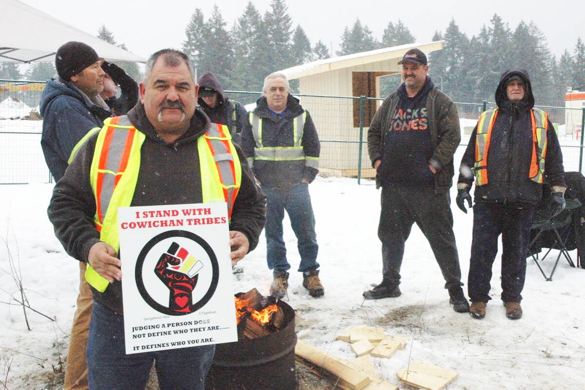 Jon Coleman (right) and other members of the Cowichan Tribes-owned Khowutzun Development Corporation, here seen blocking work at the site of the new Cowichan District Hospital on Bell McKinnon Road over union issues, has called on the provincial government to abolish an agreement that he says prevents him and other Indigenous contractors from working on the site. (Robert Barron/Citizen)