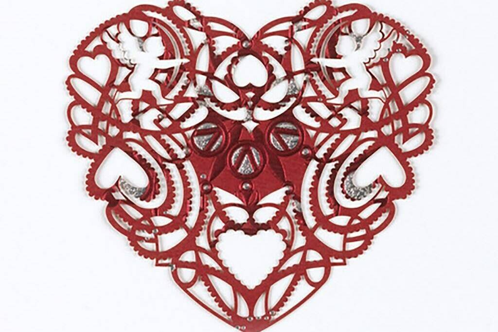 This image released by The Cooper Hewitt Smithsonian Design Museum shows a Valentine’s greeting card from 2010 made of lasercut card stock (Cooper Hewitt, Smithsonian Design Museum via AP)