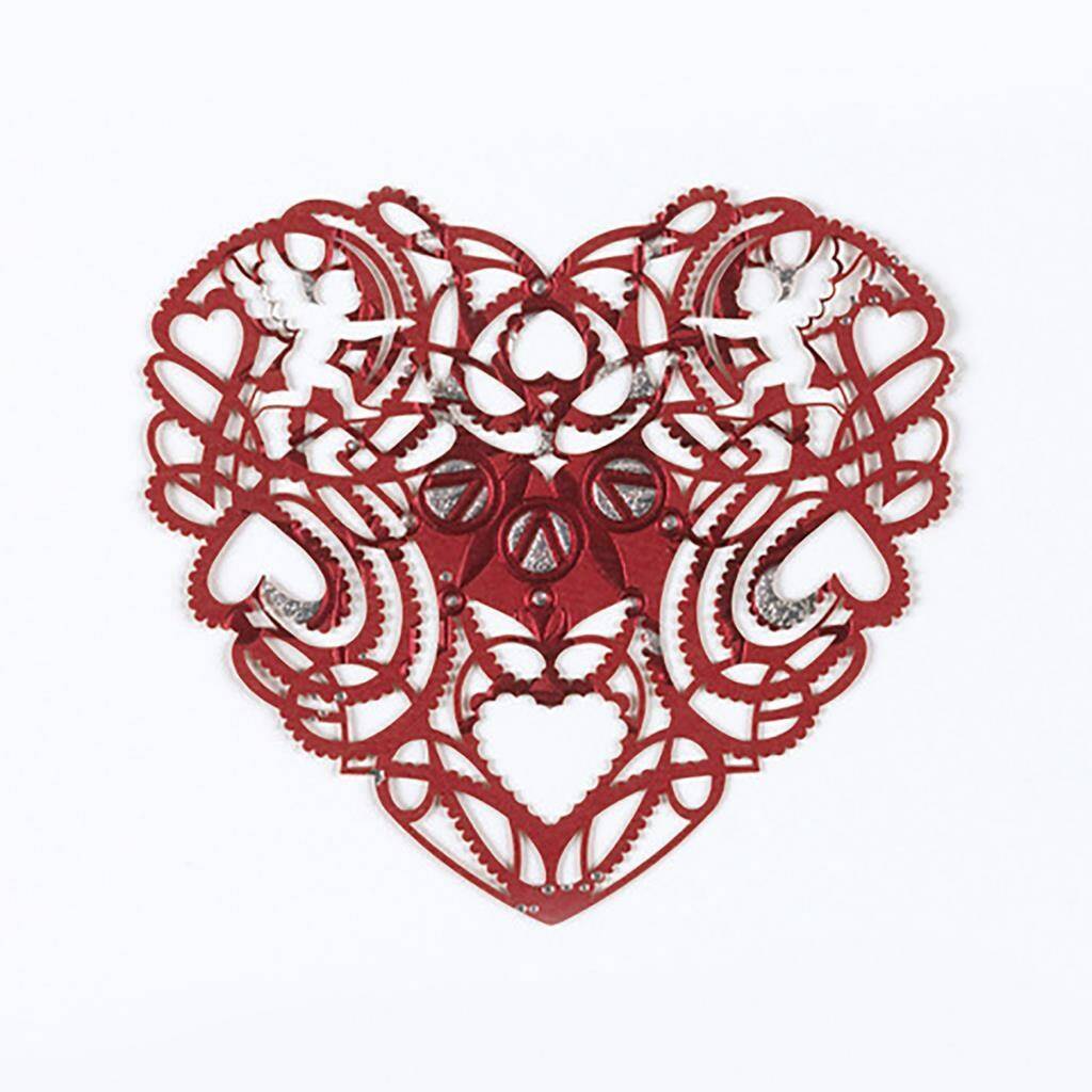 This image released by The Cooper Hewitt Smithsonian Design Museum shows a Valentine’s greeting card from 2010 made of lasercut card stock (Cooper Hewitt, Smithsonian Design Museum via AP)