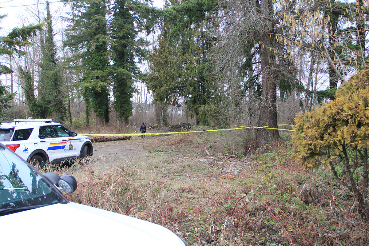 Surrey RCMP were on scene in the 19000-block of Fraser Highway Wednesday (Feb. 15), where human remains were found. The Integrated Forensic Identification Services team have been called. (Malin Jordan photo)