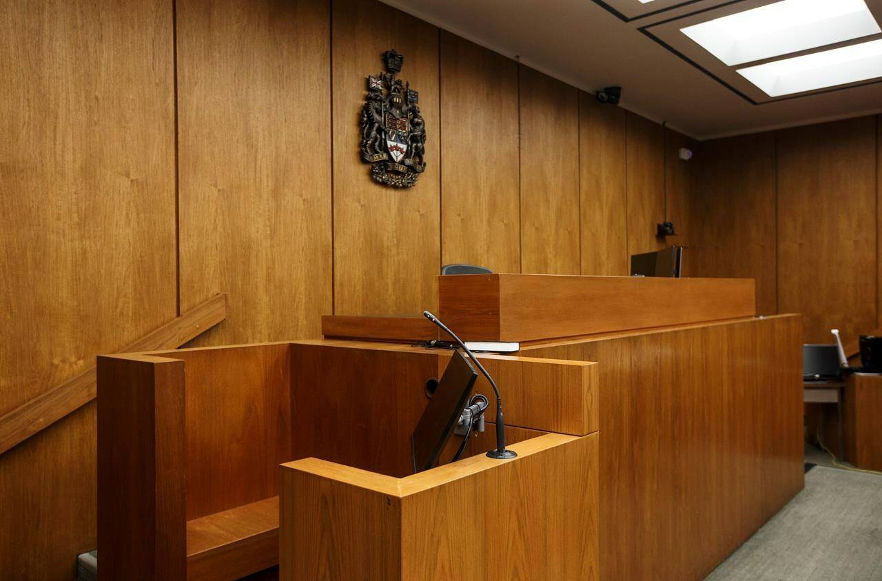 Witness box and Judges’s bench at the Edmonton Law Courts building, in Edmonton on Friday, June 28, 2019. A registry of wrongful conviction cases in Canada is launching for the first time, showing 83 cases where people had their convictions overturned. THE CANADIAN PRESS/Jason Franson