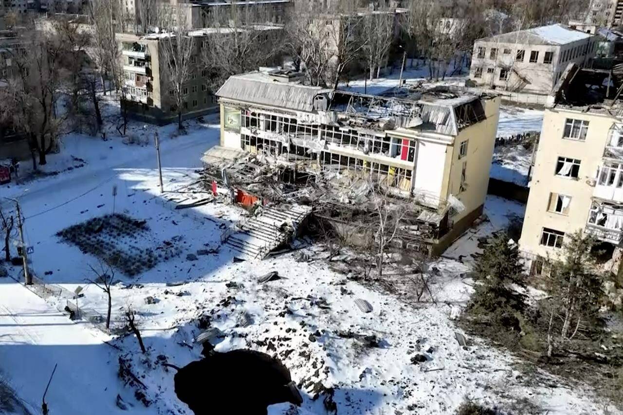 New video footage of Bakhmut shot from the air with a drone for The Associated Press shows how the longest battle of the year-long Russian invasion has turned the city of salt and gypsum mines in eastern Ukraine into a ghost town. The footage was shot Feb. 13. From the air, the scale of destruction becomes plain to see. Entire rows of apartment blocks have been gutted, just the outer walls left standing and the roofs and interior floors gone, exposing the ruins’ innards to the snow and winter frost – and the drone’s prying eye. (The Associated Press photo)