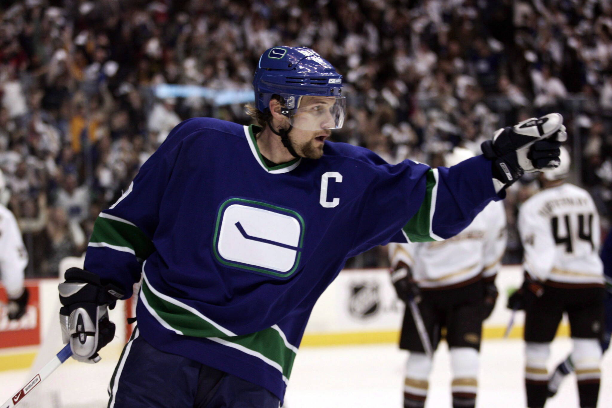 The jerseys and logos worn by the Vancouver Canucks — and, consequently, their fans — have seen several drastic changes in the four decades since the team entered the NHL, and pretty much all of those iterations can be spotted in the throngs of people out celebrating the playoffs in recent weeks. In this April 29, 2007 file photo, Vancouver Canucks' Markus Naslund celebrates after scoring against the Anaheim Ducks during the first period of an NHL playoff hockey game in Vancouver. THE CANADIAN PRESS/Richard Lam
