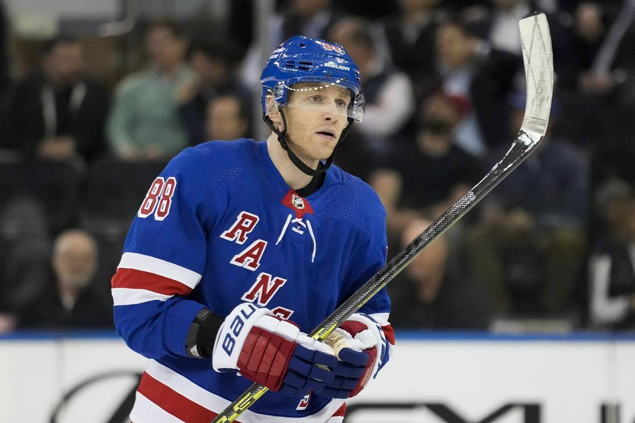 New York Rangers right wing Patrick Kane (88) skates up the ice during the first period of an NHL hockey game against the Ottawa Senators, Thursday, March 2, 2023, in New York. NHL general managers got to work early this year. And it could make for a quiet trade deadline day. THE CANADIAN PRESS/AP, John Minchillo