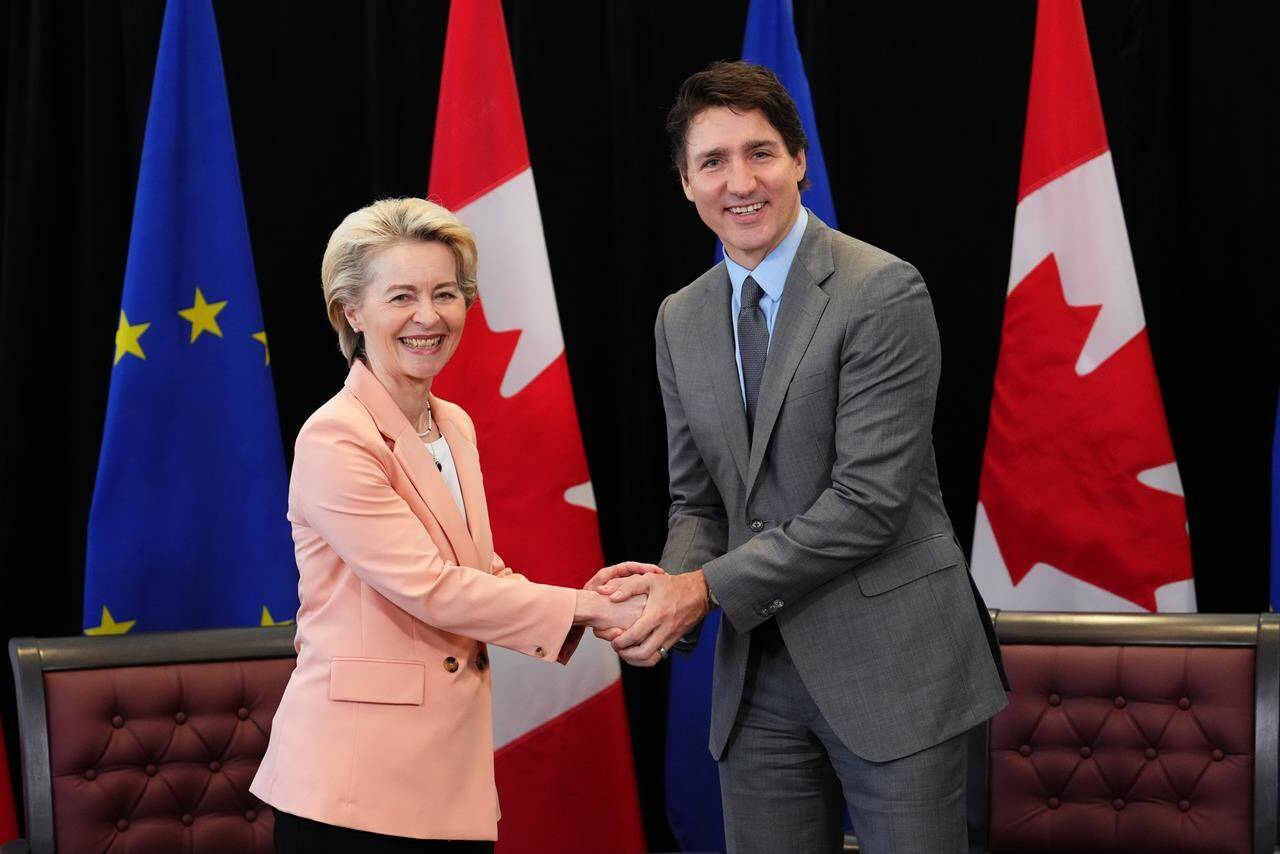 Prime Minister Justin Trudeau greets European Commission President Ursula von der Leyen during a welcoming ceremony at CFB Kingston in Kingston, Ont., Tuesday, March 7, 2023. THE CANADIAN PRESS/Sean Kilpatrick