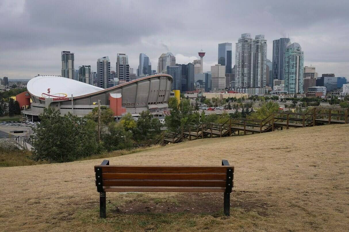 The Saddledome is seen from a hillside park in Calgary on Friday, Sept. 15, 2017. A group of Albertans says they have started to explore whether communities across the province could host the 2030 Commonwealth Games. THE CANADIAN PRESS/Jeff McIntosh