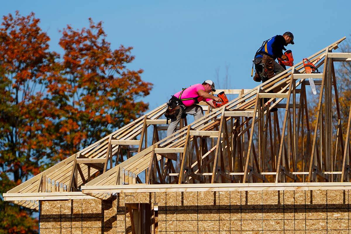B.C. is facing a growing labour shortage. But it’s more complicated than simply a lack of people to hire. In this October 2021 file photo, carpenters work on new home in Ottawa. THE CANADIAN PRESS/Sean Kilpatrick