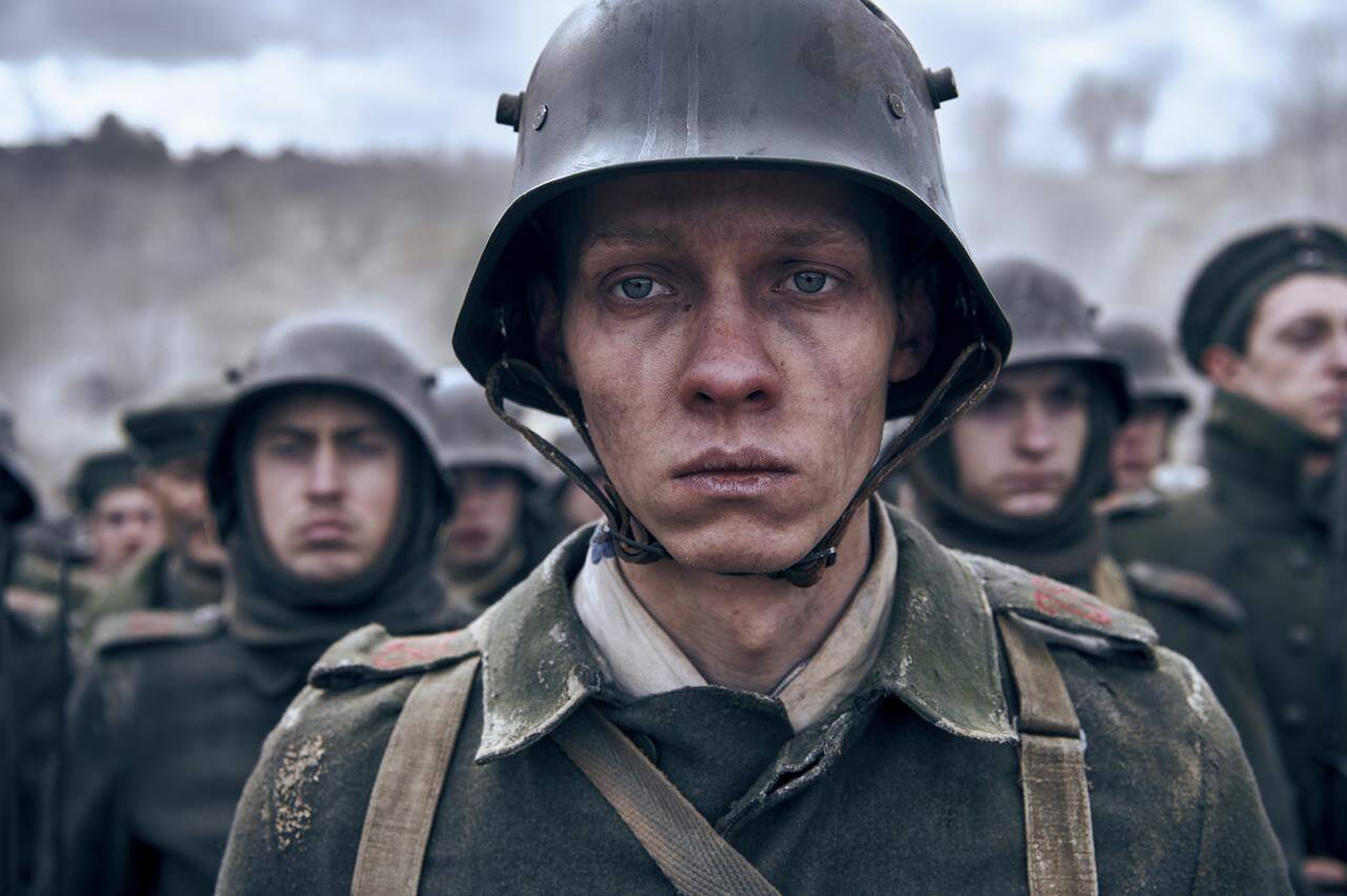 This image released by Netflix shows Felix Kammerer in a scene from “All Quiet on the Western Front.” (Reiner Bajo/Netflix via AP)