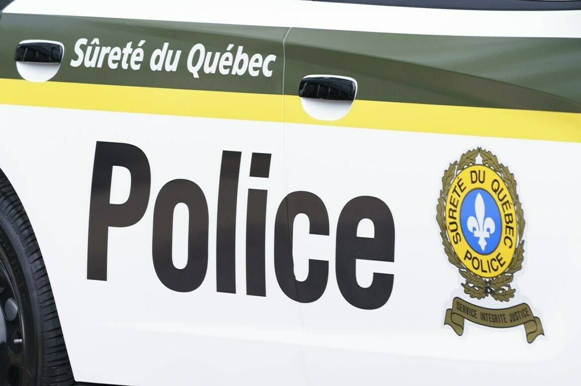 A Quebec provincial police car is seen in Montreal on Wednesday, July 22, 2020. Police say several people have been injured after a vehicle plowed into pedestrians who were walking by the side of a road in Amqui, in Quebec’s Bas-St-Laurent region. THE CANADIAN PRESS/Paul Chiasson