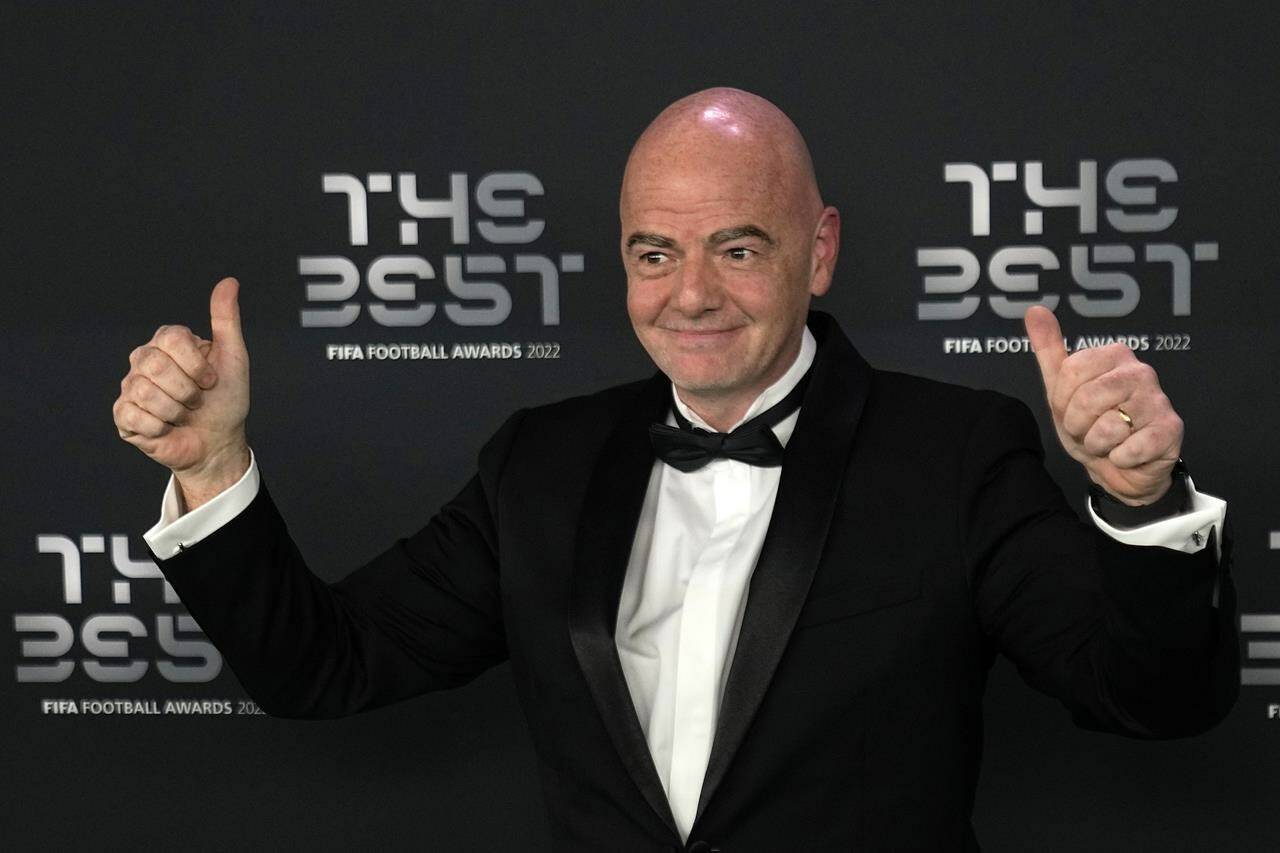 FIFA president Gianni Infantino poses on the green carpet before the ceremony of the Best FIFA Football Awards in Paris, France, Monday, Feb. 27, 2023. (AP Photo/Michel Euler)
