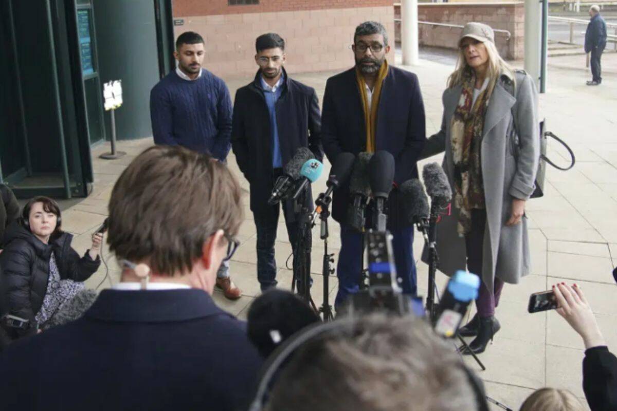 Mohammed Ramzan, second right, right, outside Preston Crown Court, Lancashire, England, Tuesday March 14, 2023. A 22-year-old woman has been jailed for eight-and-a-half years after falsely claiming to have been the victim of an Asian grooming gang. Eleanor Williams, of Barrow-in-Furness, Cumbria, was sentenced at Preston Crown Court on Tuesday after making a series of false rape allegations. Mohammed Ramzan, a business owner who Williams alleged trafficked her, told the court: “I have had countless death threats made over social media from people all over the world because of what they thought I was involved in.” (Peter Byrne/PA via AP)