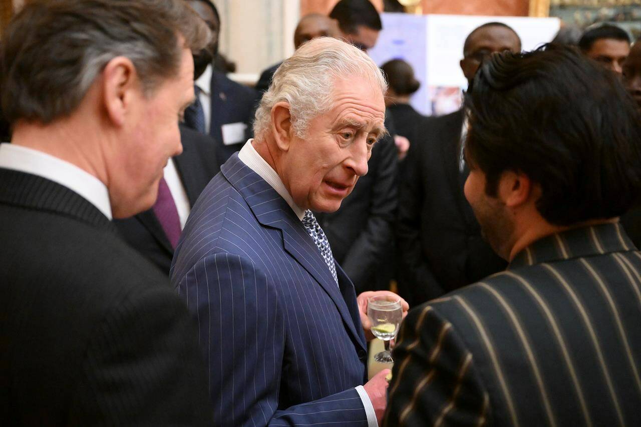 King Charles speaks to members of the Commonwealth community during the annual Commonwealth Day reception at Buckingham Palace in London, Monday March 13, 2023. Prime Minister Justin Trudeau says Canada will hold a special ceremony marking the coronation of King Charles on May 6. THE CANADIAN PRESS/AP-Daniel Leal/Pool via AP