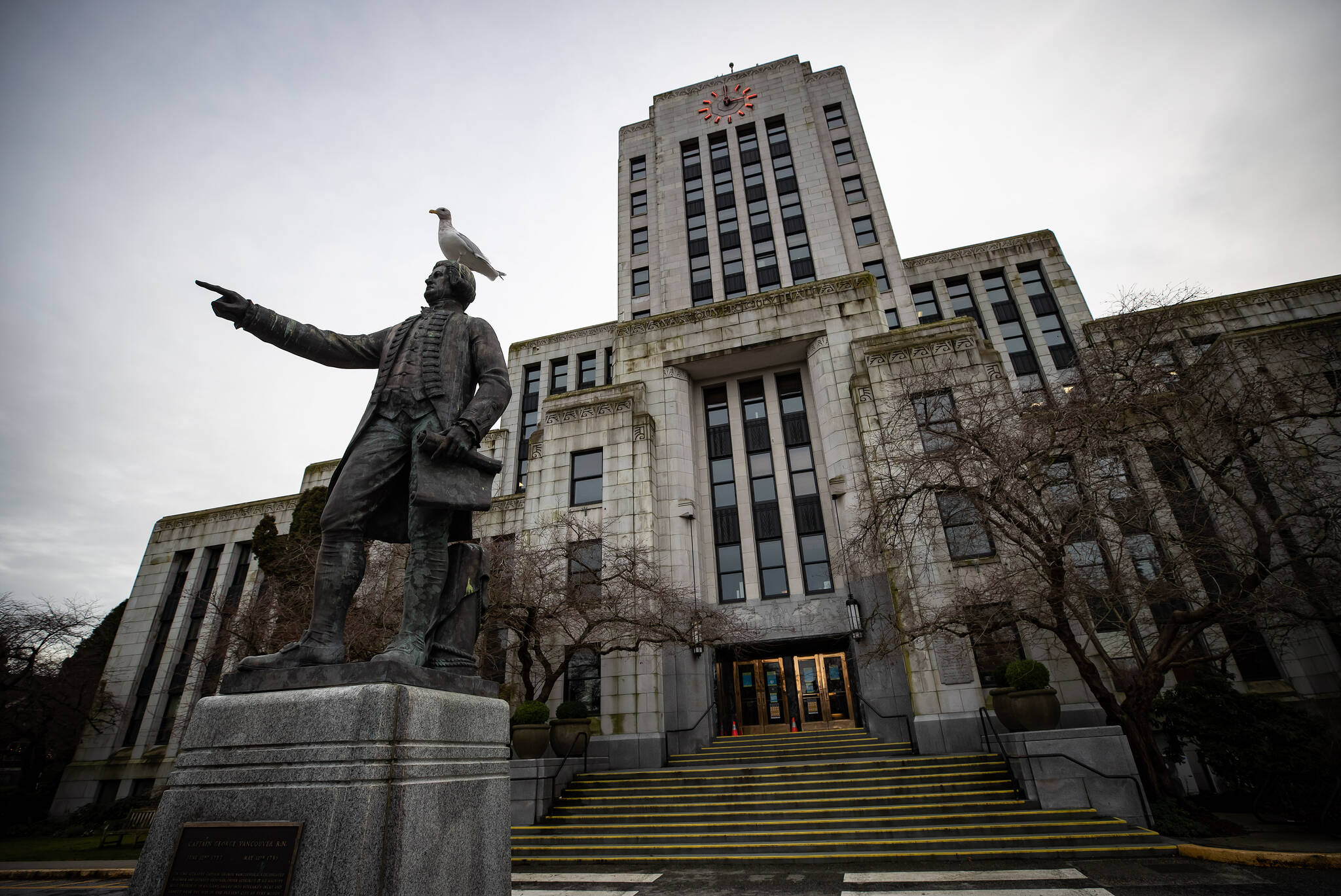 A seagull stands atop a statue of Captain George Vancouver outside Vancouver City Hall, on Saturday, January 9, 2021. Statistics Canada data published last month confirmed that B.C. leads the country as the province with the highest rate of unaffordable homes, due largely to the number of people paying high rents to live in downtown Vancouver. Voters in Vancouver’s municipal election have been met with an array of solutions. THE CANADIAN PRESS/Darryl Dyck