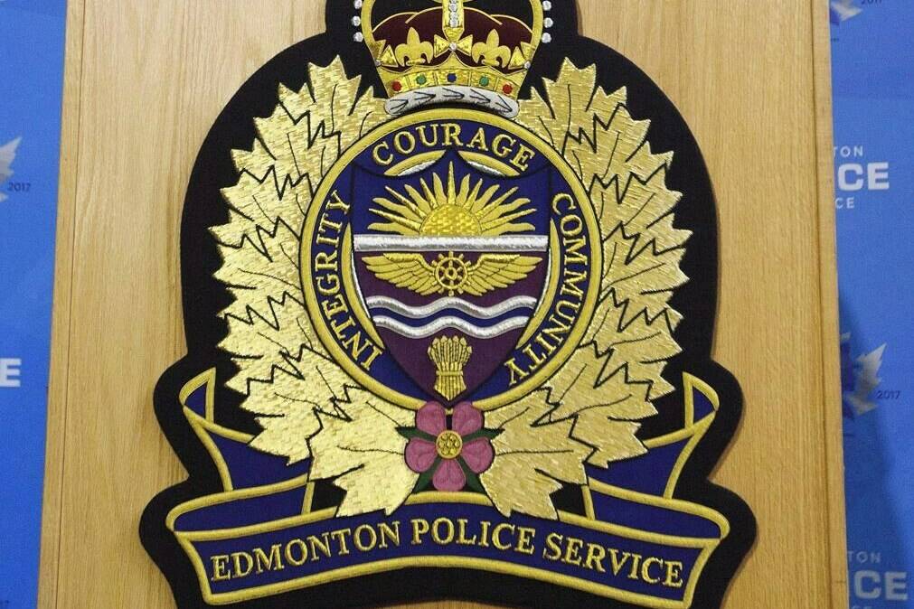 An Edmonton Police Service logo is shown at a press conference in Edmonton, Oct. 2, 2017. The Edmonton Police Service says in a news release that two patrol officers were killed while responding to a call Thursday. THE CANADIAN PRESS/Jason Franson