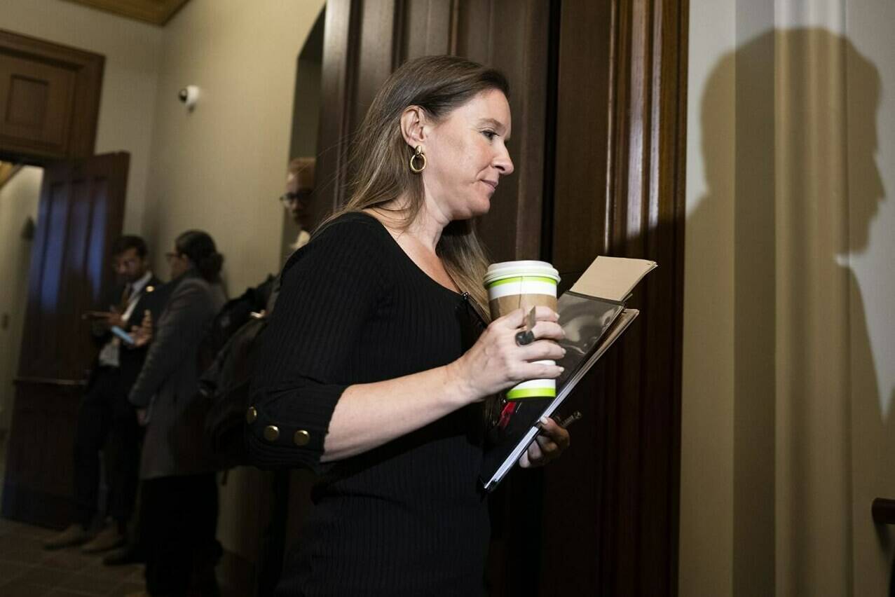 Katie Telford, Chief of Staff to Prime Minister Justin Trudeau, leaves after a meeting of the Liberal Caucus on Parliament Hill in Ottawa, on Wednesday, March 8, 2023. The federal Conservatives are trying to force Prime Minister Justin Trudeau’s top aide to answer questions about allegations the Chinese government interfered in Canada’s last two federal elections. THE CANADIAN PRESS/Justin Tang