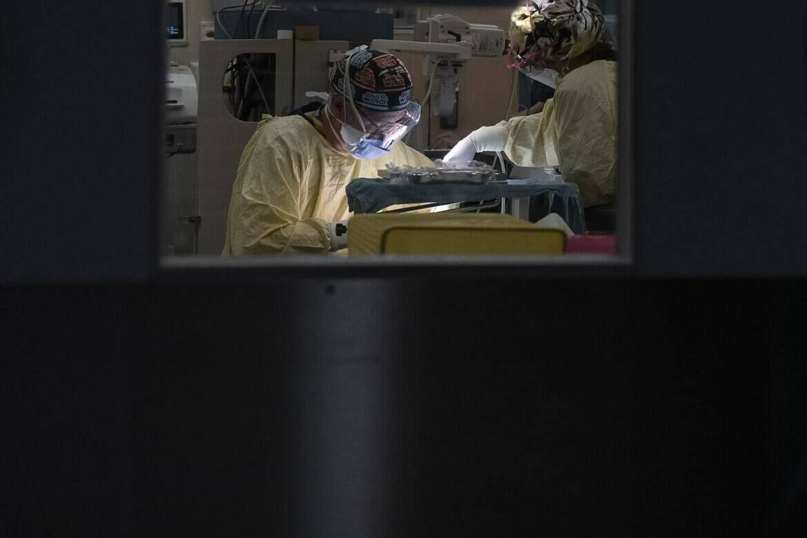 A surgery is performed in the operating room at Toronto’s Hospital for Sick Children on Wednesday, November 30, 2022. THE CANADIAN PRESS/Chris Young