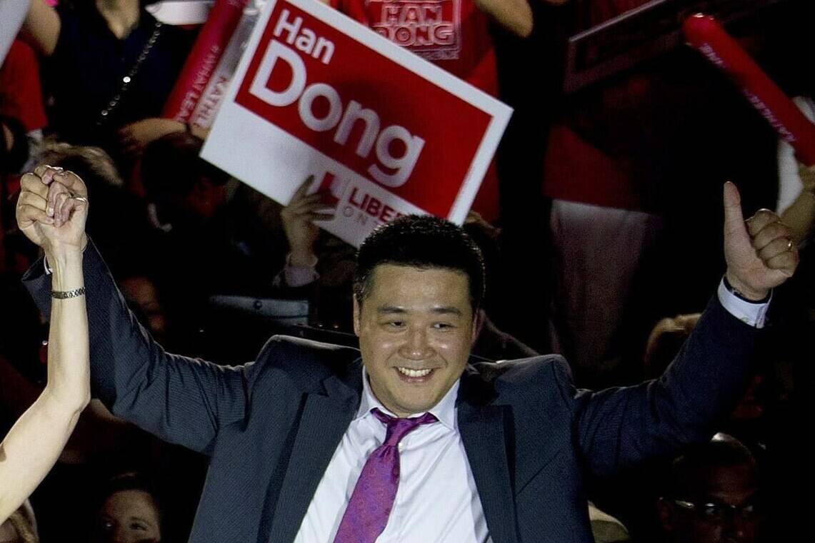 Beijing says it has nothing to say about ongoing allegations that China has meddled in Canadian affairs, including about a Liberal MP resigning from the party Wednesday night. Provincial Liberal candidate Han Dong celebrates with supporters while taking part in a rally in Toronto on Thursday, May 22, 2014. THE CANADIAN PRESS/Nathan Denette