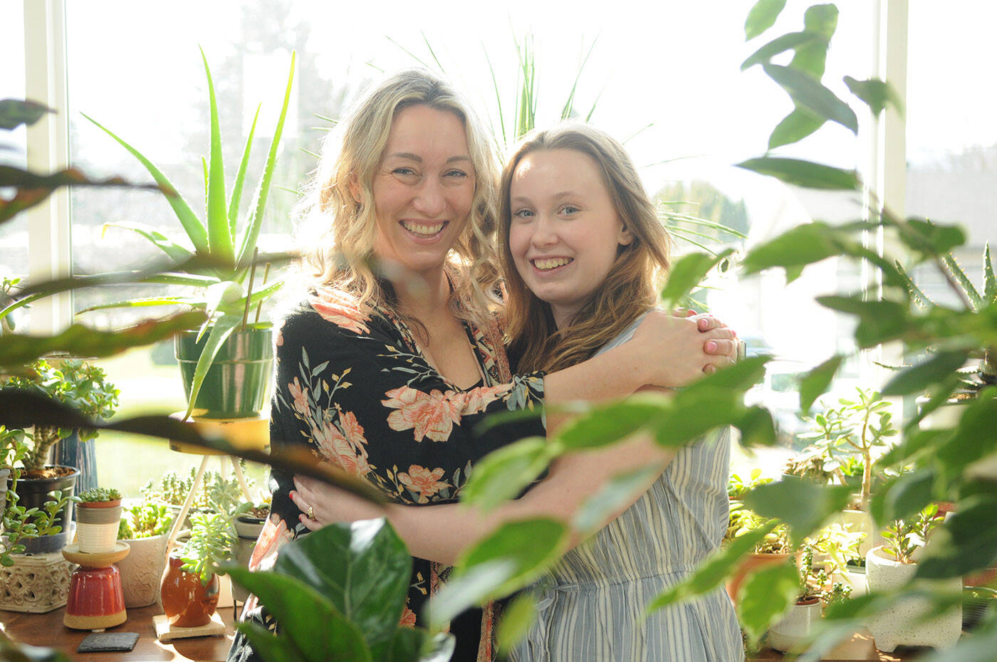 Chilliwack burn survivor Keira McKenzie, 15, seen with mom Terresa, is the 2023 ‘champion’ for the BC Children’s Hospital Foundation. She is encouraging people to buy tickets to the Choice Lottery to raise money for the hospital – a place she’s visited countless times. (Jenna Hauck/ Chilliwack Progress)