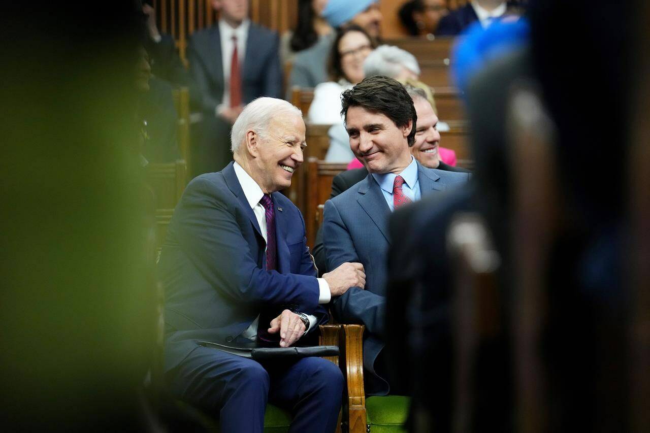 Prime Minister Justin Trudeau and U.S. President Joe Biden share a laugh after Biden’s address to Parliament in the House of Commons, on Parliament Hill, in Ottawa, Friday, March 24, 2023. U.S. envoy David Cohen says Biden’s visit was an authentic, intimate showcase of how important Canada continues to be to its southern neighbour. THE CANADIAN PRESS/Sean Kilpatrick
