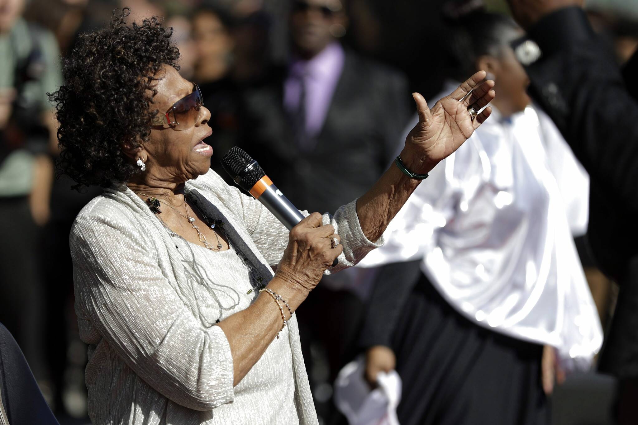 Cissy Houston, mother of the late singer Whitney Houston, performs with the New Hope Baptist Choir during the grand opening of the Grammy Museum Experience at Prudential Center, Thursday, Oct. 19, 2017, in Newark, N.J. (AP Photo/Julio Cortez)