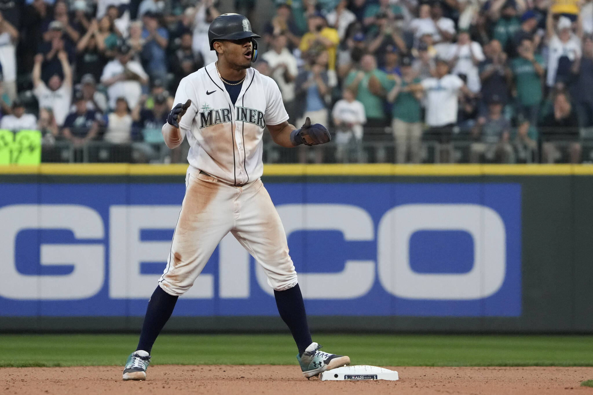 Seattle Mariners’s Julio Rodriguez reacts after stealing second base during the 13th inning in Game 3 of an American League Division Series baseball game against the Houston Astros, Saturday, Oct. 15, 2022, in Seattle. (AP Photo/Ted S. Warren)