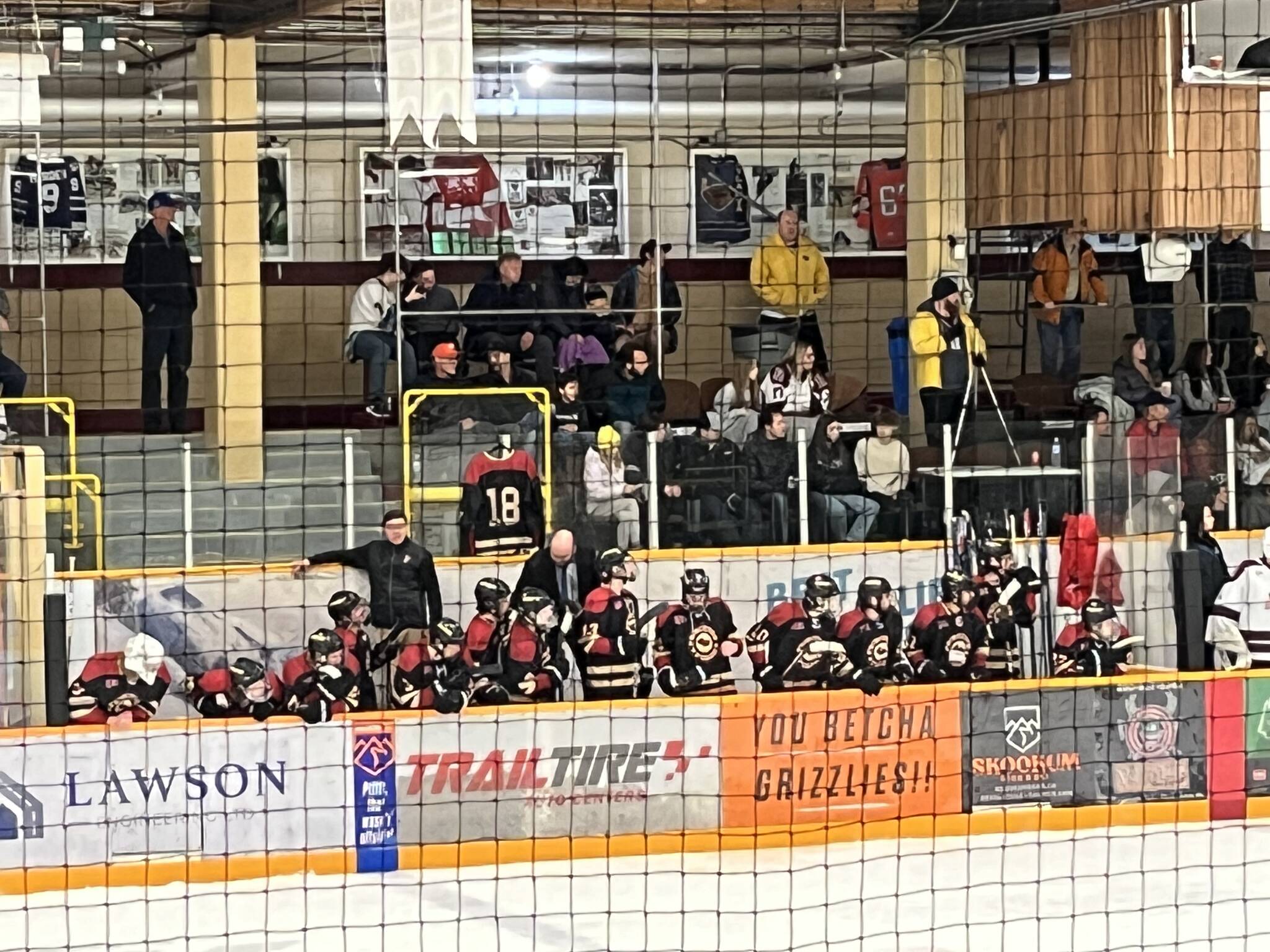 A Posse jersey with the number 18 on it hanging above the team as they faced the Revelstoke Grizzlies on Sunday night. (Revelstoke Review)