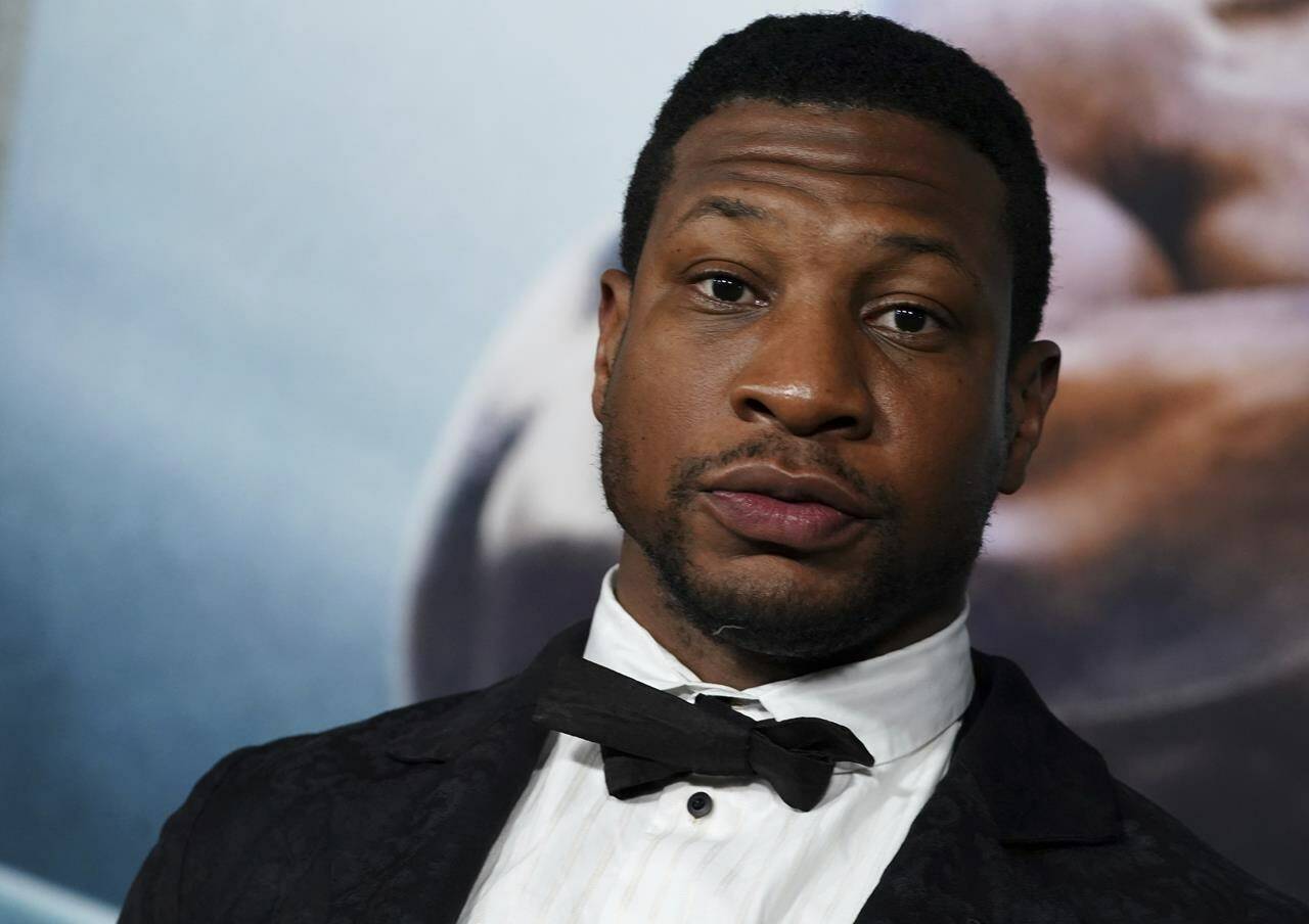 FILE - Jonathan Majors arrives at the premiere of “Creed III” on Feb. 27, 2023, at TCL Chinese Theatre in Los Angeles. The arrest of actor Majors on Saturday, March 25, 2023, has upended the Army’s newly launched advertising campaign that was aimed at reviving the service’s struggling recruiting numbers. (Photo by Jordan Strauss/Invision/AP, File)