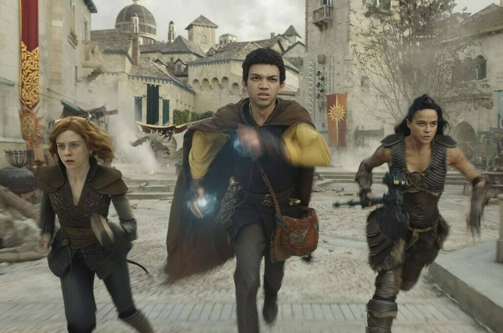 This image released by Paramount Pictures shows Sophia Lillis, from left, Justice Smith and Michelle Rodriguez in a scene from “Dungeons & Dragons: Honor Among Thieves.” (Paramount Pictures via AP)