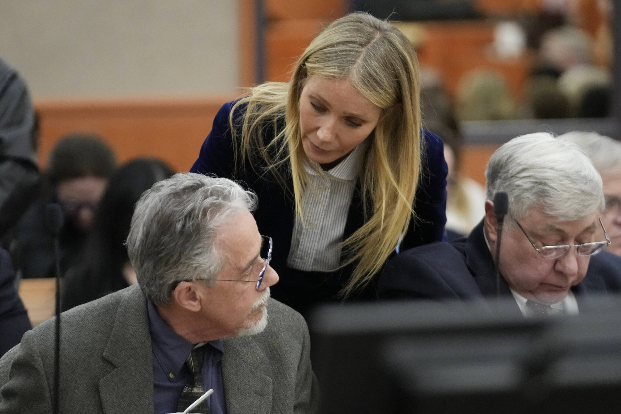 Gwyneth Paltrow speaks with retired optometrist Terry Sanderson,left, as she walks out of the courtroom following the reading of the verdict in their lawsuit trial, Thursday, March 30, 2023, in Park City, Utah. Paltrow won her court battle over a 2016 ski collision at a posh Utah ski resort after a jury decided Thursday that the movie star wasn’t at fault for the crash. (AP Photo/Rick Bowmer, Pool)