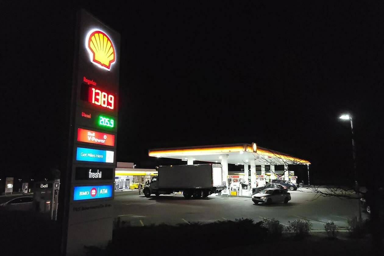 A gas station displays its prices in Bowmanville, Ont. on Monday Dec. 5, 2022. It will cost many Canadians a bit more to fill gas tanks or heat their houses next month as the national carbon price rises Saturday in the three prairie provinces and Ontario. THE CANADIAN PRESS/Doug Ives