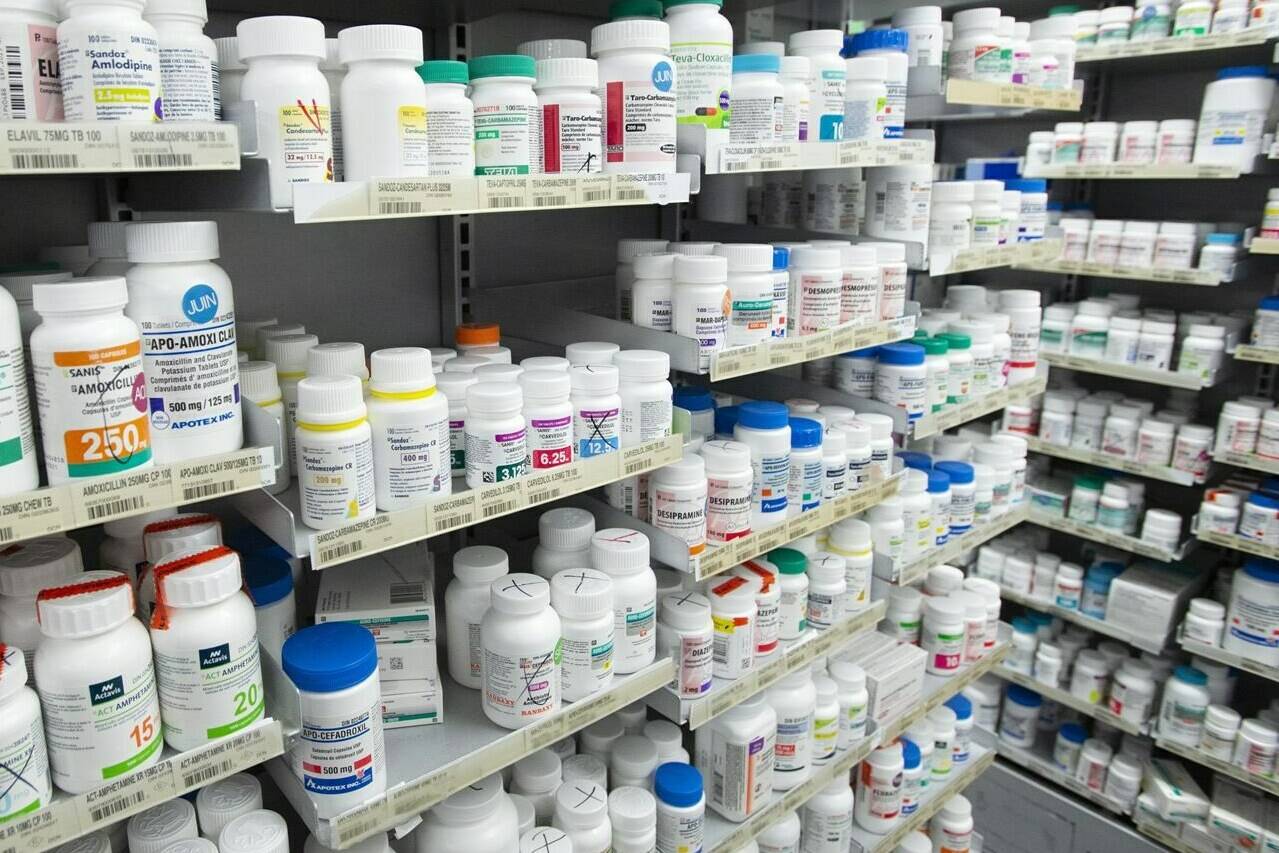 The Canadian Pharmacists Association says protecting Canadian drug supplies from mass exportation to the U.S. market remains a priority in light of B.C.’s recent move to limit sales of the diabetes drug Ozempic, which has been hyped as a weight-loss treatment. Prescription drugs are seen on shelves at a pharmacy in Montreal on March 11, 2021. THE CANADIAN PRESS/Ryan Remiorz