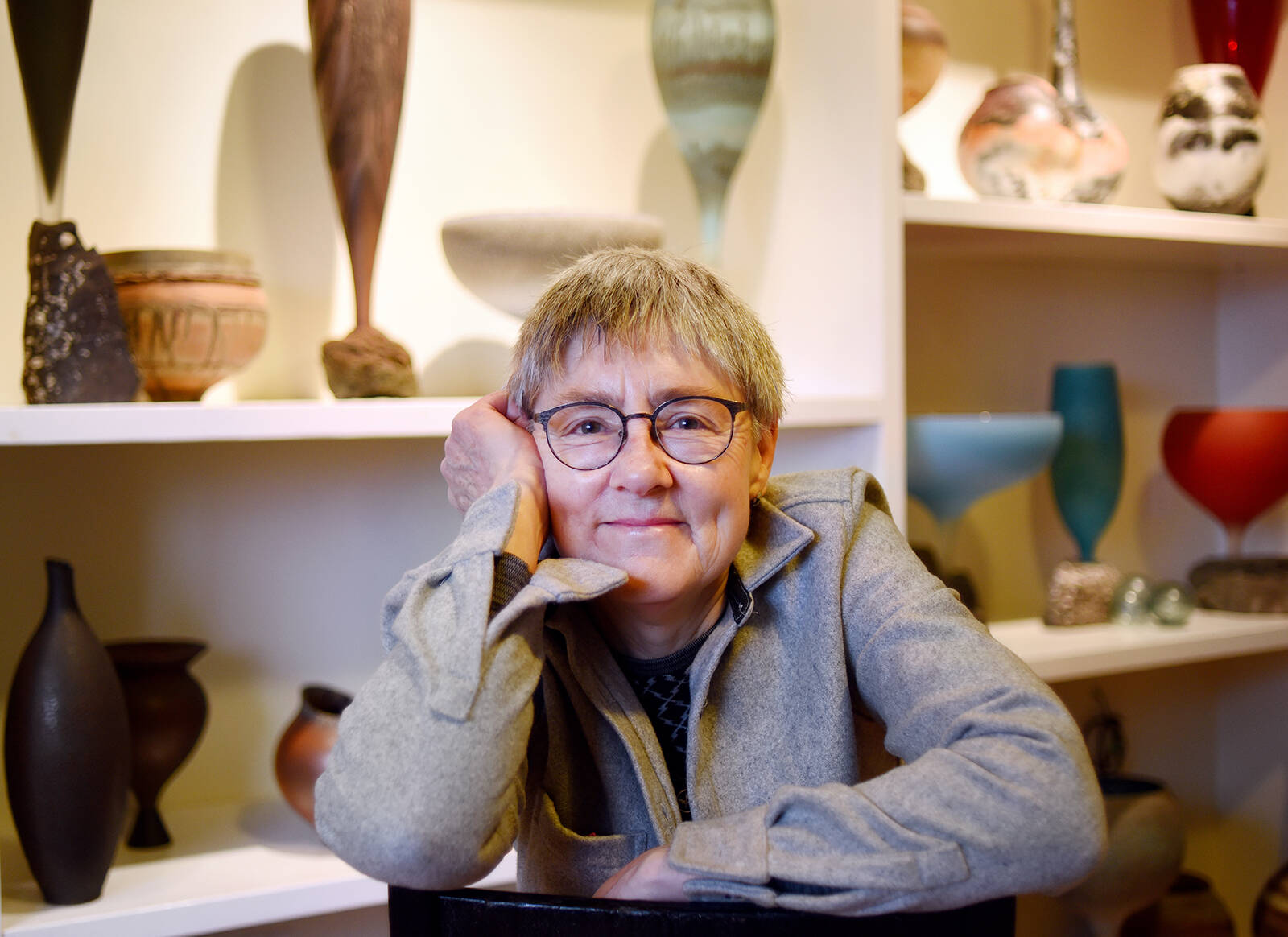 January 12, 2023 - Pottery artist Mary Fox in her Ladysmith home studio with some of her creations. Don Denton photo