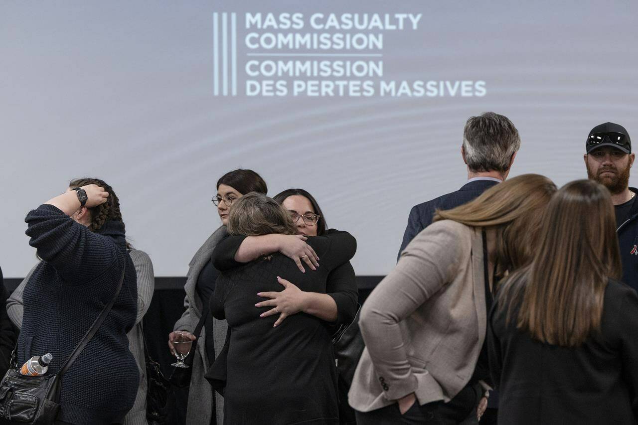 Family, friends and supporters of the victims of the mass killings in rural Nova Scotia in 2020 gather following the release of the Mass Casualty Commission inquiry’s final report in Truro, N.S. on Thursday, March 30, 2023. THE CANADIAN PRESS/Darren Calabrese