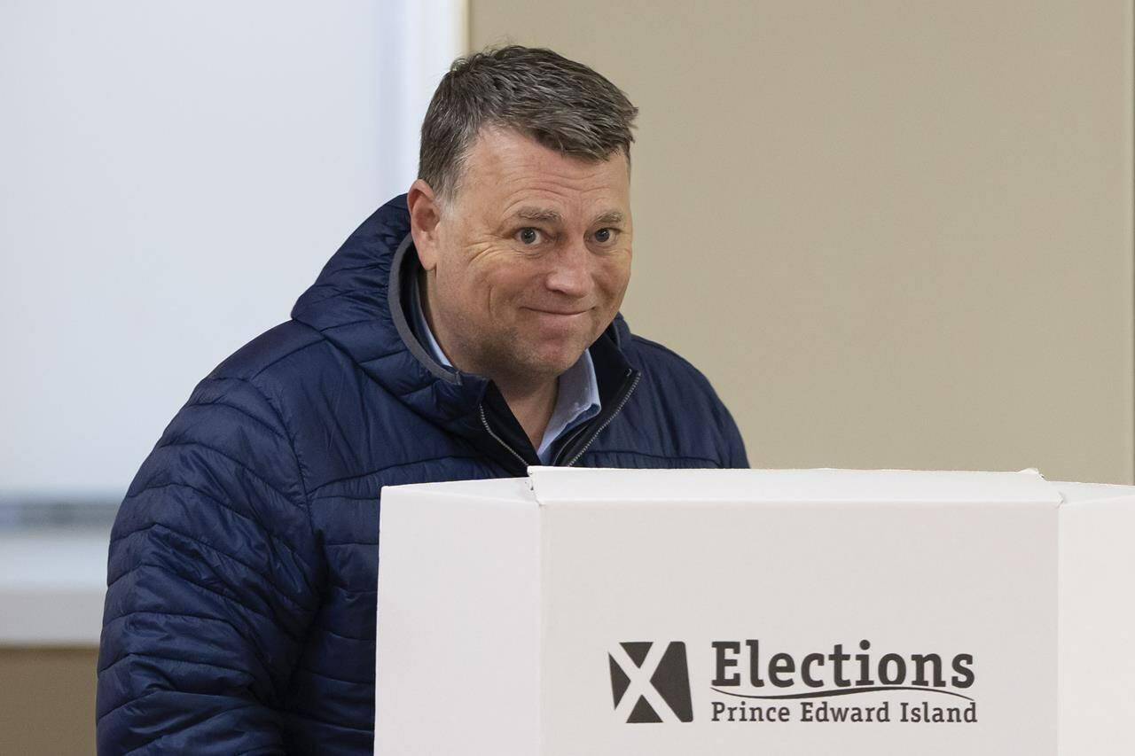 Dennis King, leader of the Progressive Conservative Party of P.E.I., prepares to cast his vote in the provincial election in Hunter River, P.E.I on Monday, April 3, 2023. THE CANADIAN PRESS/Darren Calabrese