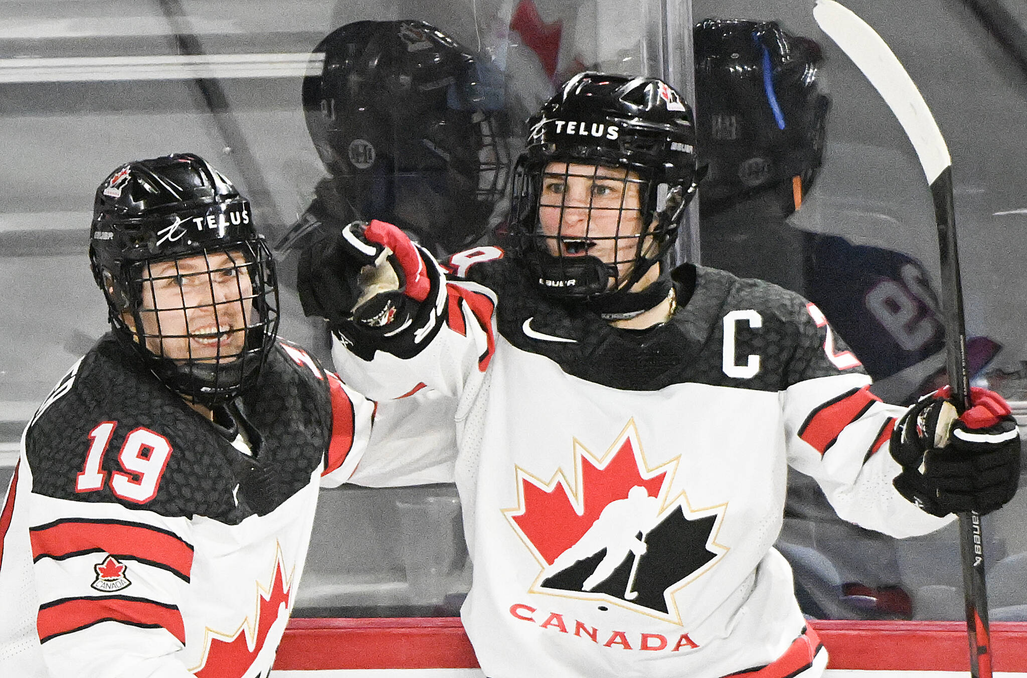 Marie-Philip Poulin (29) of Canada celebrates with teammate Brianne Jenner (19) after scoring against the USA during second period Rivalry Series hockey action in Laval, Que., Wednesday, February 22, 2023. Canada opens defence of its women’s world hockey championship against Switzerland on Wednesday. THE CANADIAN PRESS/Graham Hughes