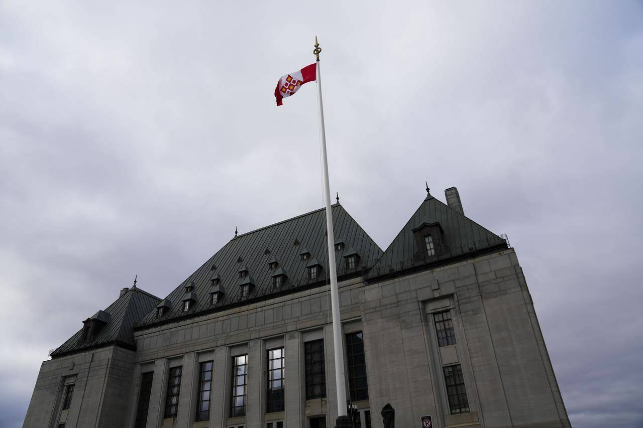 A recent Research Co. poll showed how honest Canadians are in their relationships. Seen here a Canadian flag flies at the Supreme Court of Canada in Ottawa, on Monday, Nov. 28, 2022. THE CANADIAN PRESS/Sean Kilpatrick
