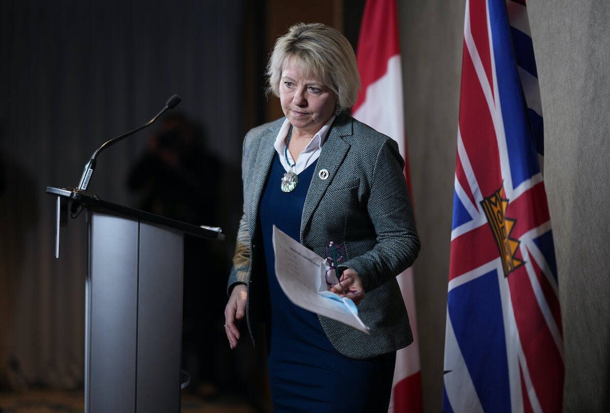 B.C. Provincial Health Officer Dr. Bonnie Henry steps away from the podium after speaking during a news conference in Vancouver, on Monday, January 30, 2023. British Columbia is introducing a policy of decriminalization on Tuesday as part of what it says is an overall plan to prevent overdose deaths from illicit drugs. THE CANADIAN PRESS/Darryl Dyck