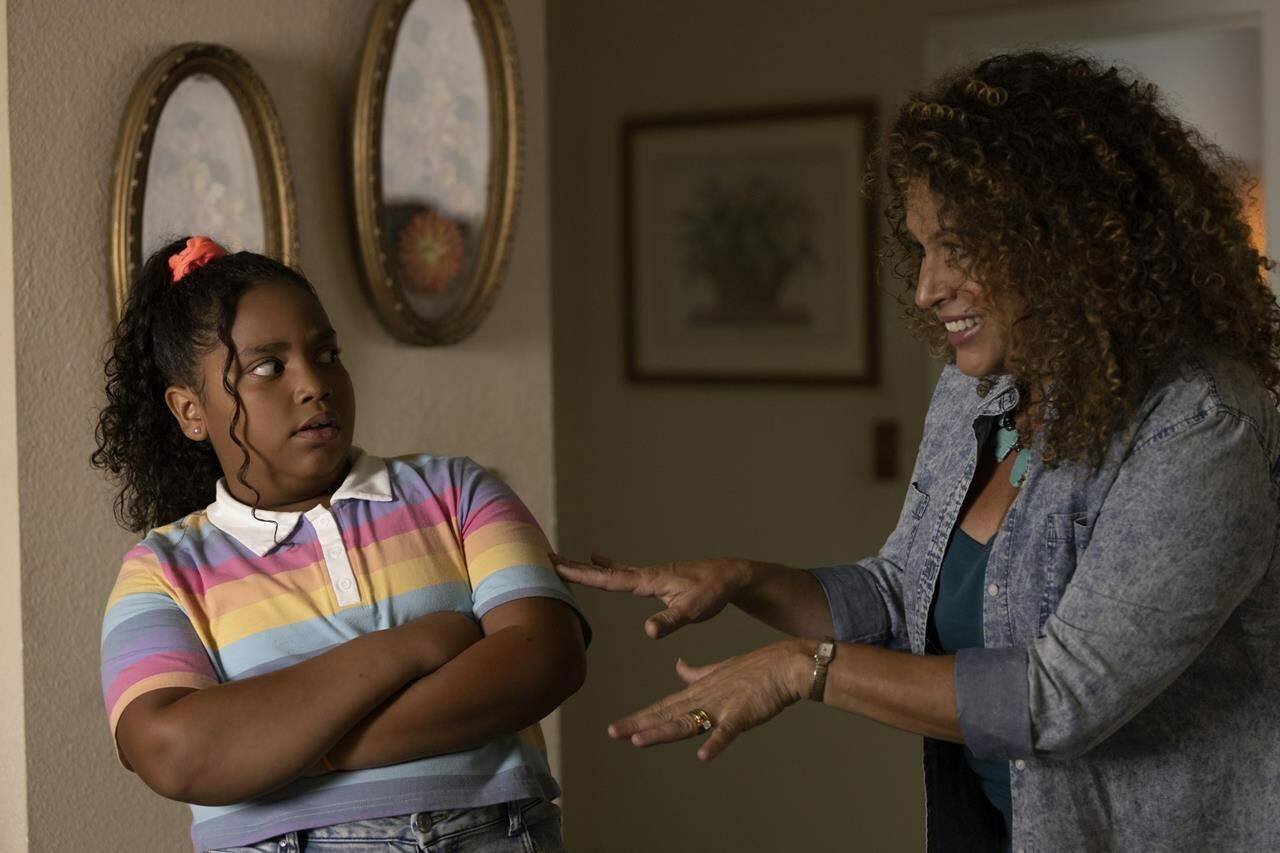 This image released by HBO Max shows Olivia Goncalves, left, and Diana Maria Riva in a scene from the canceled series “Gordita Chronicles.” (Laura Magruder/HBO Max via AP)