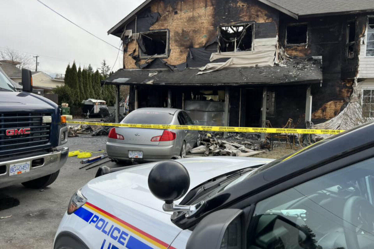 RCMP and Chilliwack Fire Department investigators on the scene on Feb. 22, 2023 where a home on Victoria Avenue was destroyed in the early hours of Feb. 20. (Paul Henderson/ Chilliwack Progress)