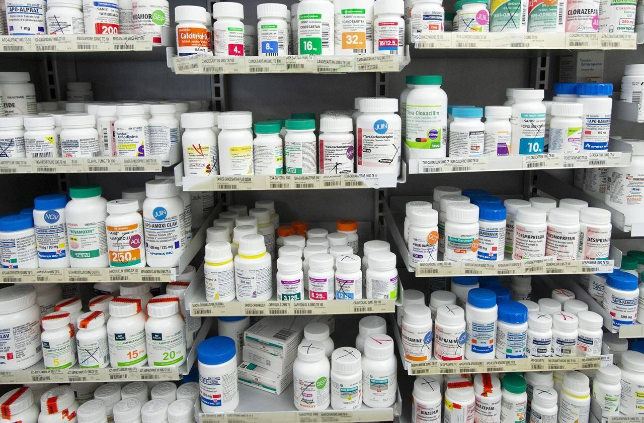 Prescription drugs are seen on shelves at a pharmacy in Montreal, Thursday, March 11, 2021. Canada’s pharmacists worry a lack of data about prescription management could see a repeat of the situation with diabetes and weight-loss drug Ozempic, in which thousands of doses have been mailed over the border to Americans. THE CANADIAN PRESS/Ryan Remiorz