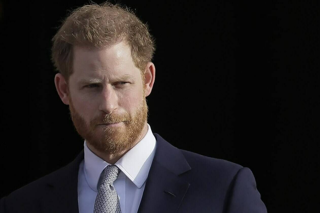 FILE - Britain’s Prince Harry arrives in the gardens of Buckingham Palace in London, Jan 16, 2020. Buckingham Palace says Prince Harry will attend the Coronation service of his father, King Charles III, at Westminster Abbey on May 6, setting aside months of speculation about his presence. (AP Photo/Kirsty Wigglesworth, File)